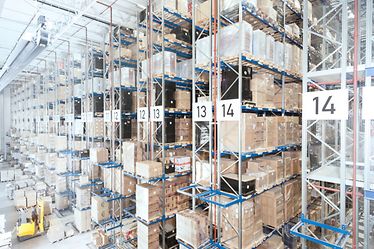 Pallet rack with cartons on euro pallets